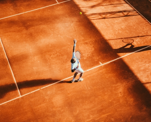 Finanzgespräch beim Tennis