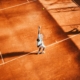 Finanzgespräch beim Tennis